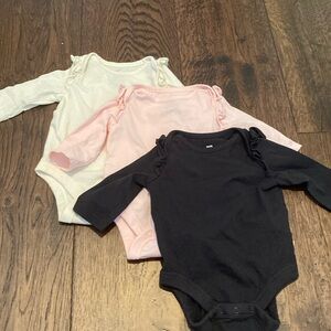 Set of 3 ruffle long-sleeve onesies. Size 0-3.